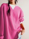 Deep rose long-sleeve sweatshirt with white contrast neckline trim and crew neck