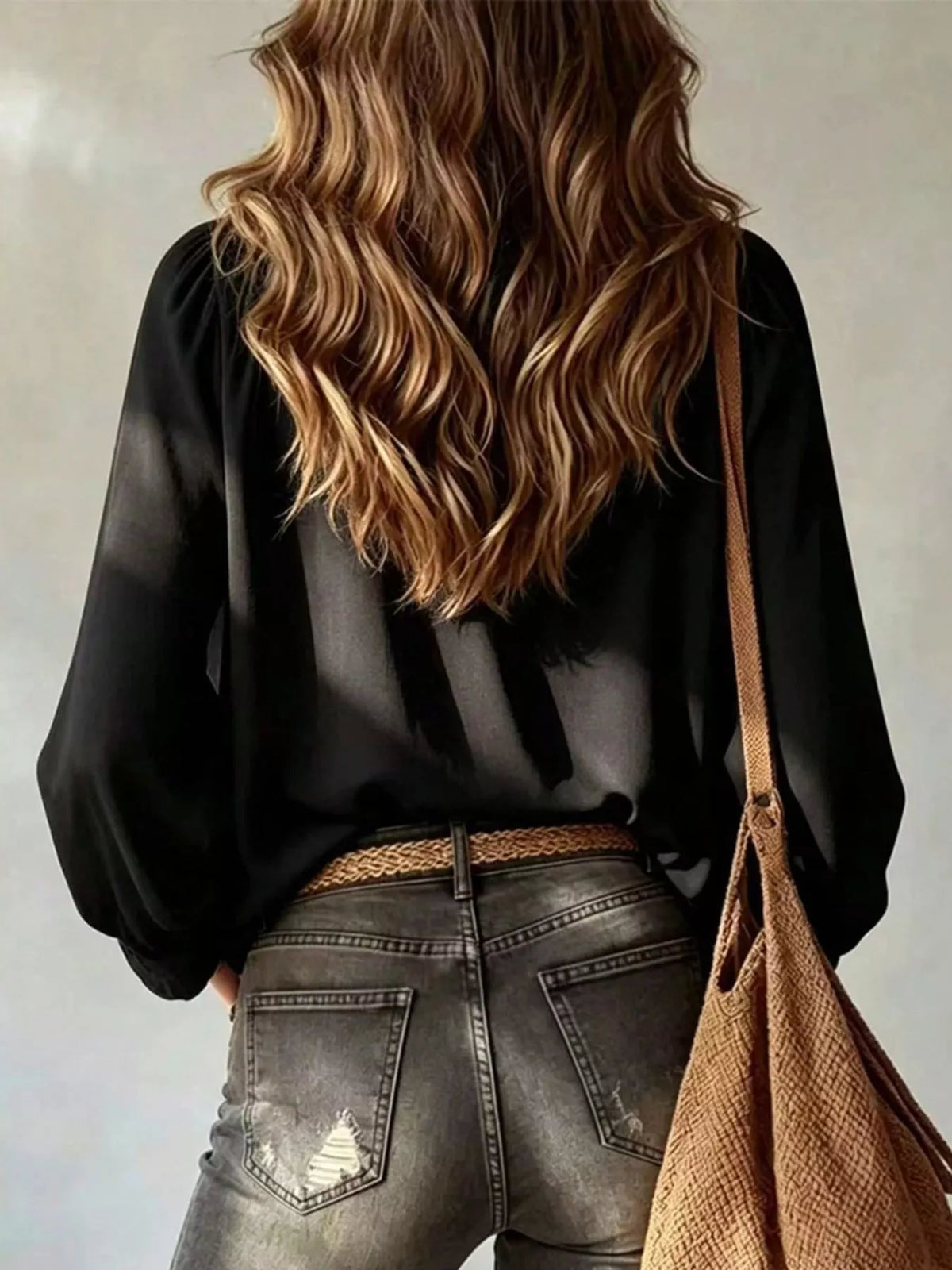 Black ruffle V-neck front-tie blouse top, rear view with long sleeves