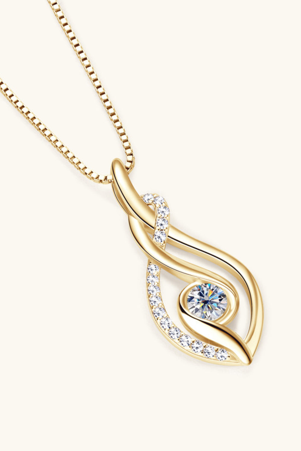 Gold moissanite necklace teardrop pendant with pavé edges and round center stone