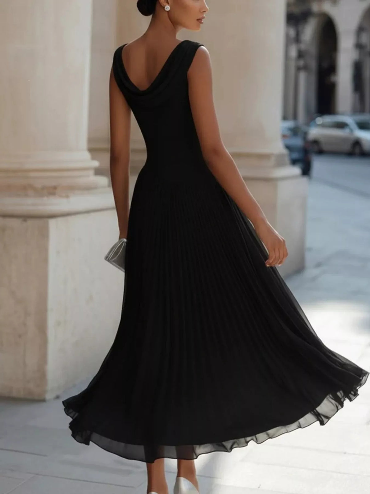 Black sleeveless cowl neck midi dress with V-back and pleated full skirt