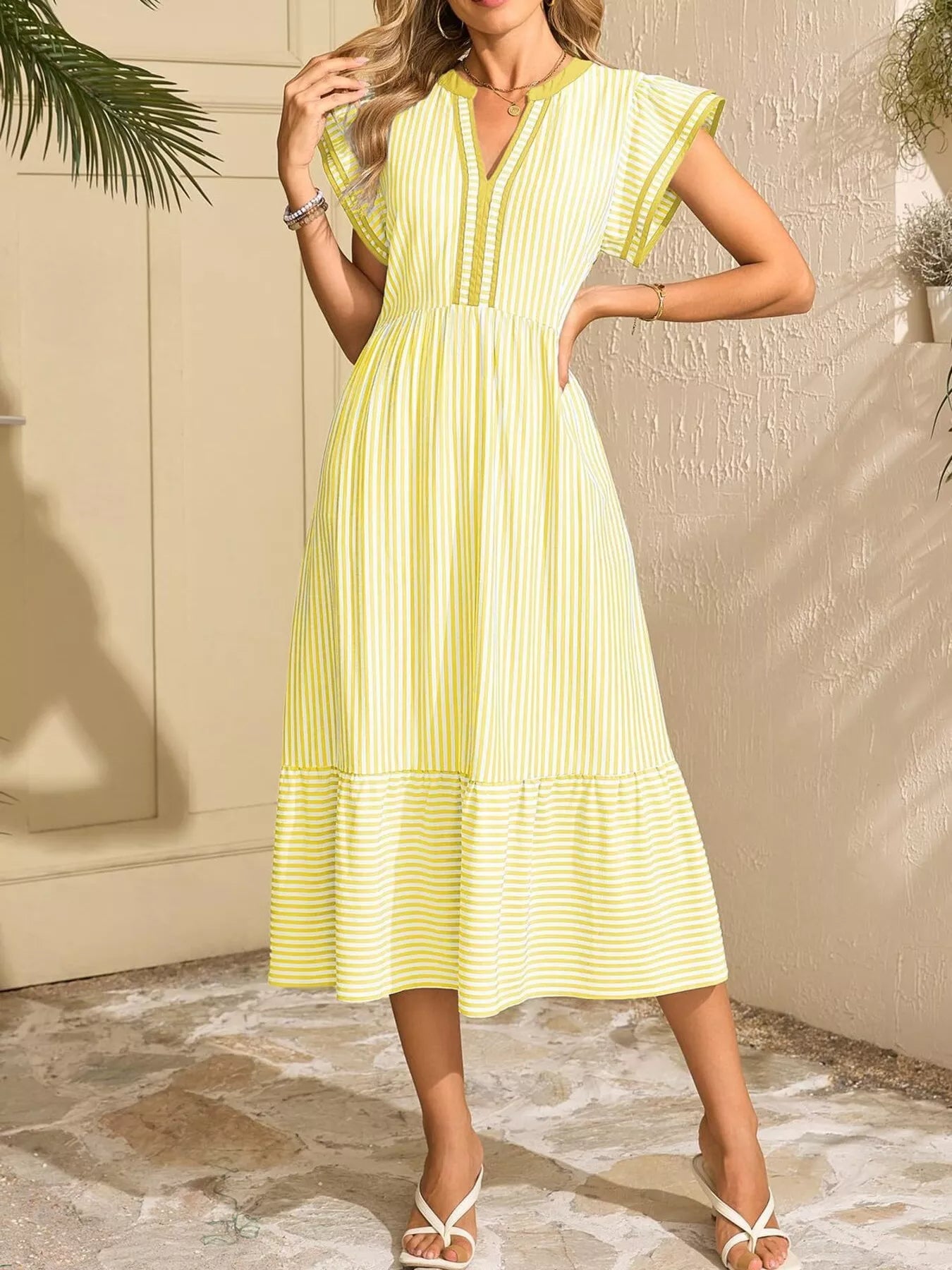 Striped Notched Ruffle Sleeve Dress in yellow and white, pocketed, by Trendsi