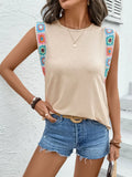 Tan round-neck sleeveless T-shirt with colorful crochet trim at shoulder seams