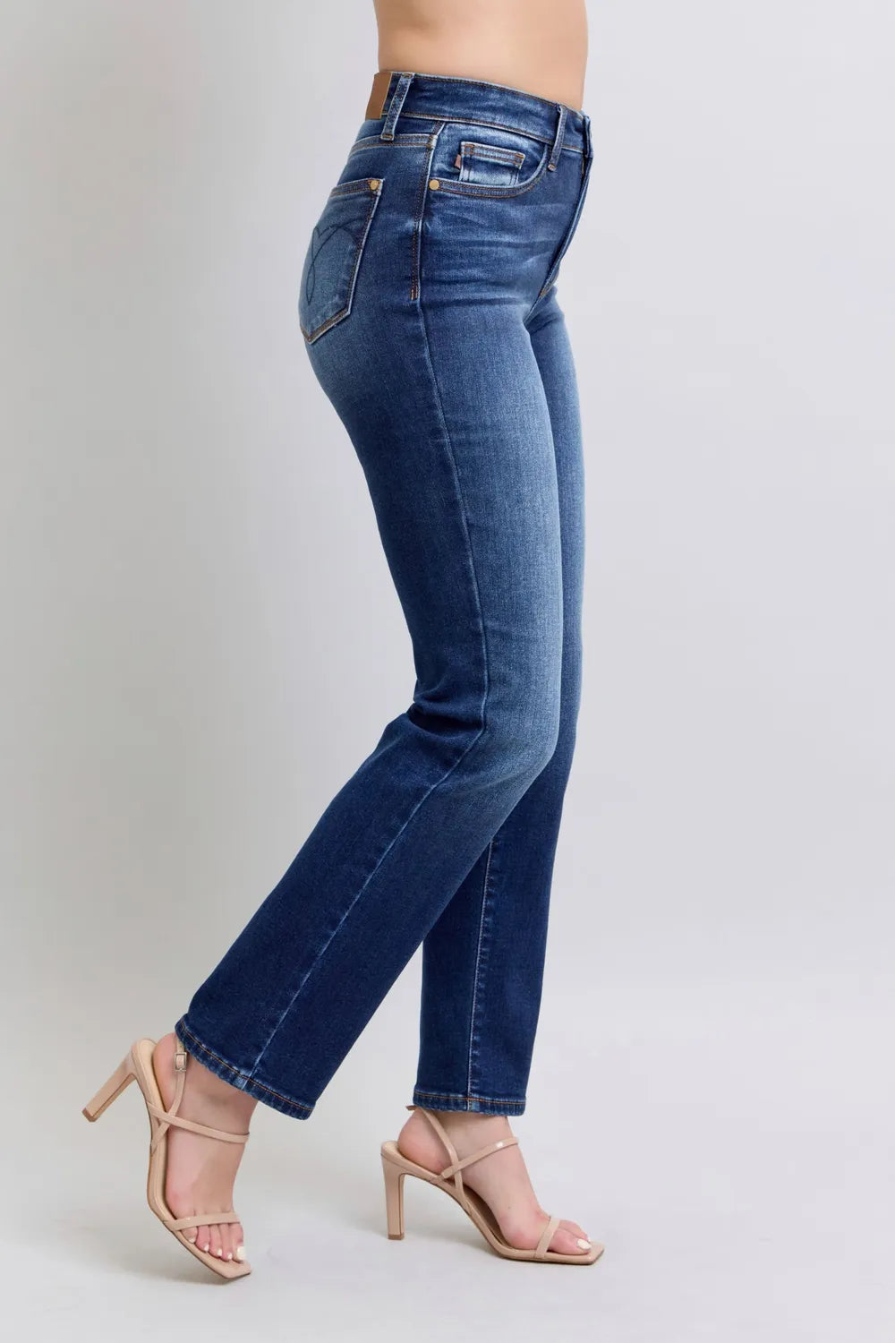 Washed dark blue straight-leg jeans with side seam and front pocket detail