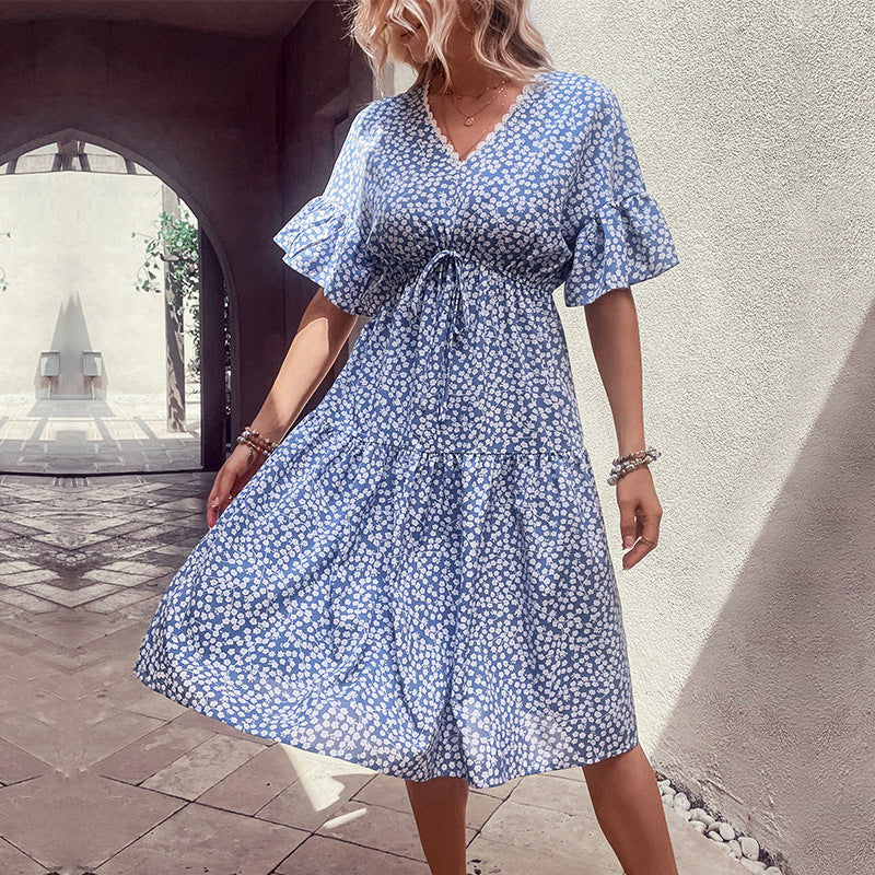 Light blue floral v-neck dress with flutter flounce sleeves and gathered skirt