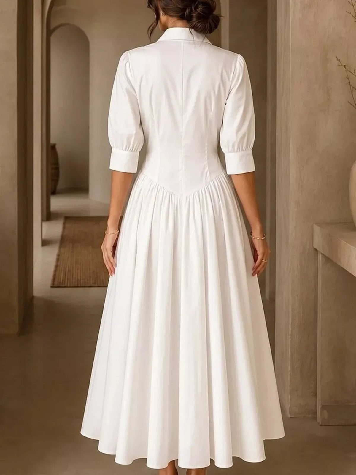 White button-down shirt dress, back view, cinched waist and flared skirt