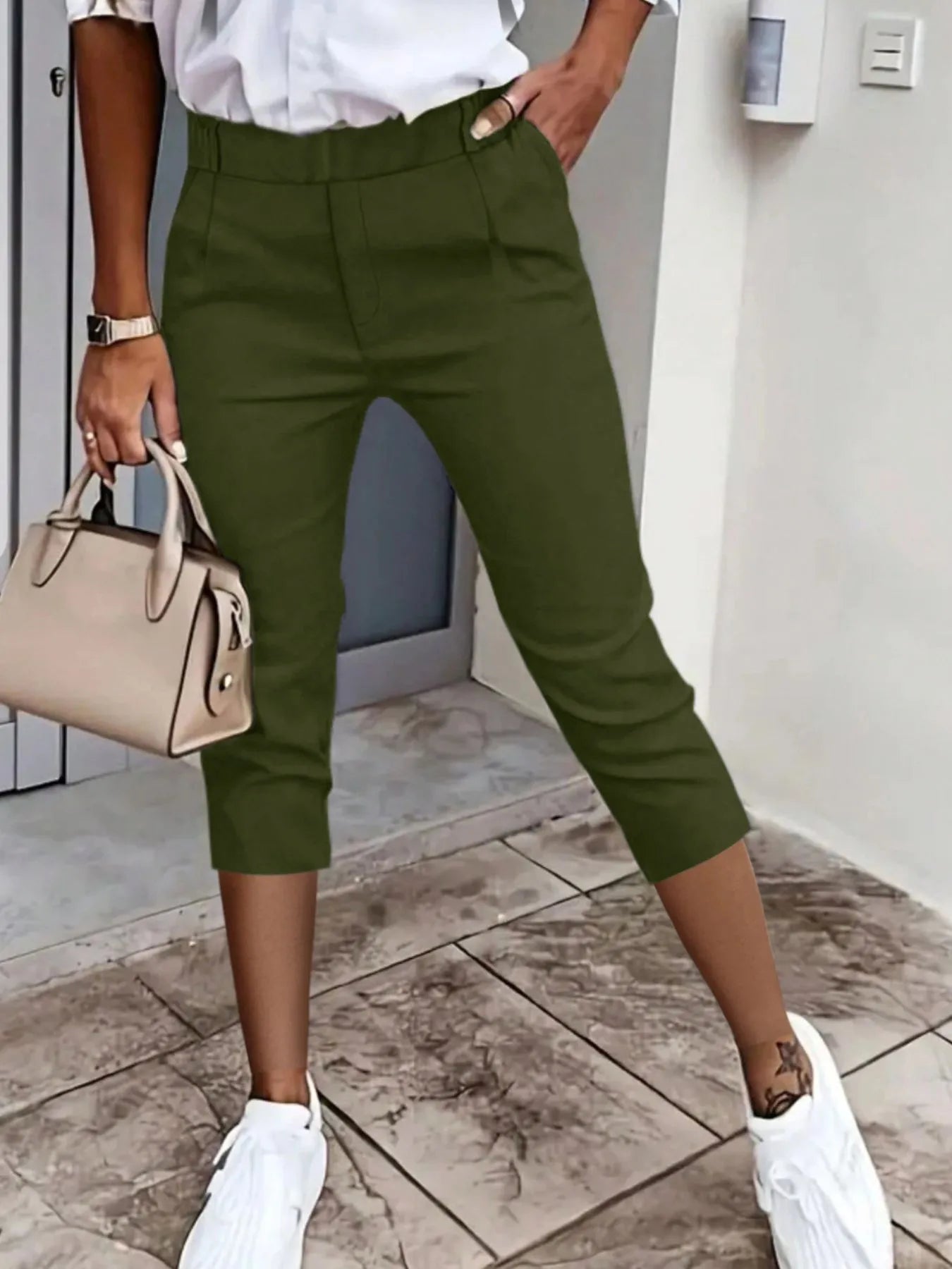 Olive green pleated detail pants with pockets, cropped hem and cuffed ankle