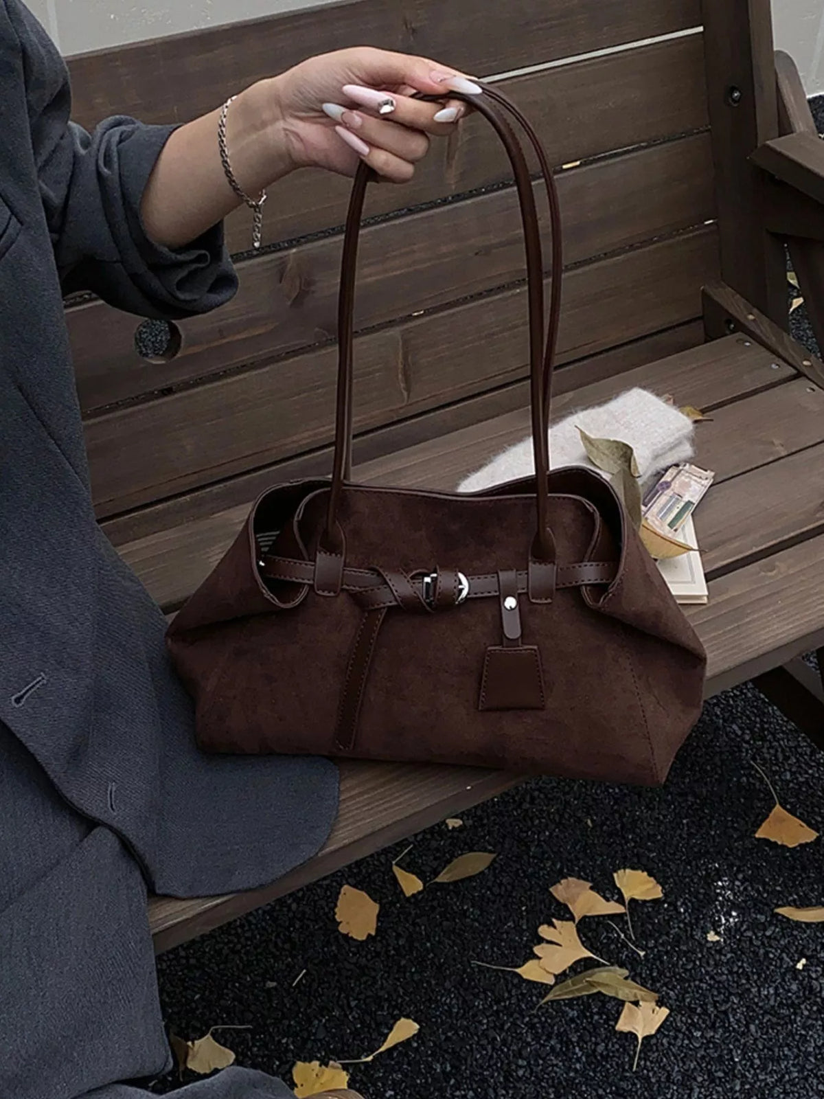 Dark brown suede buckle shoulder bag with top handles and front square patch pocket