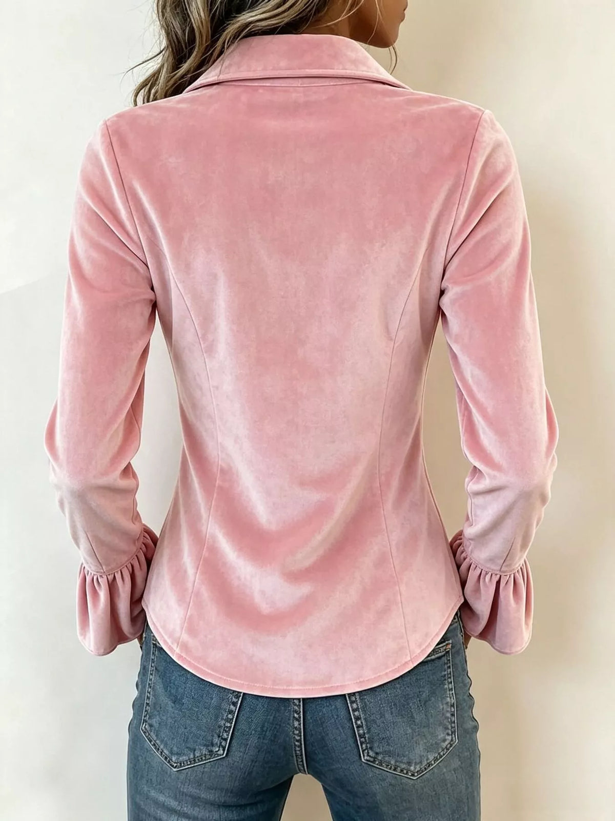 Pink velvet button-down top with ruched back and ruffle cuffs