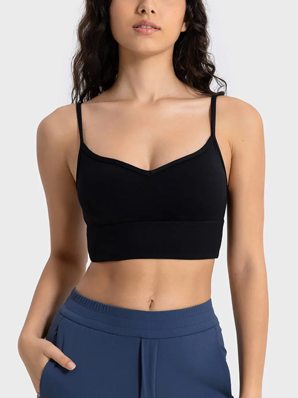 Black spaghetti strap sport bra with V-neck front and smooth stretch fit