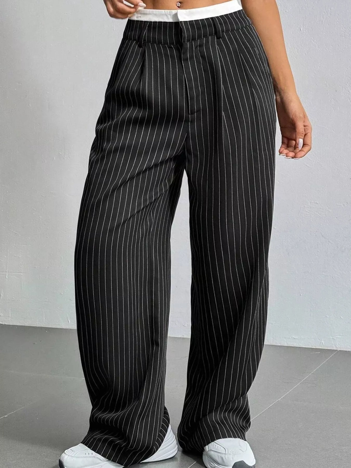 Black pinstriped high-waist wide-leg pants with elastic waistband