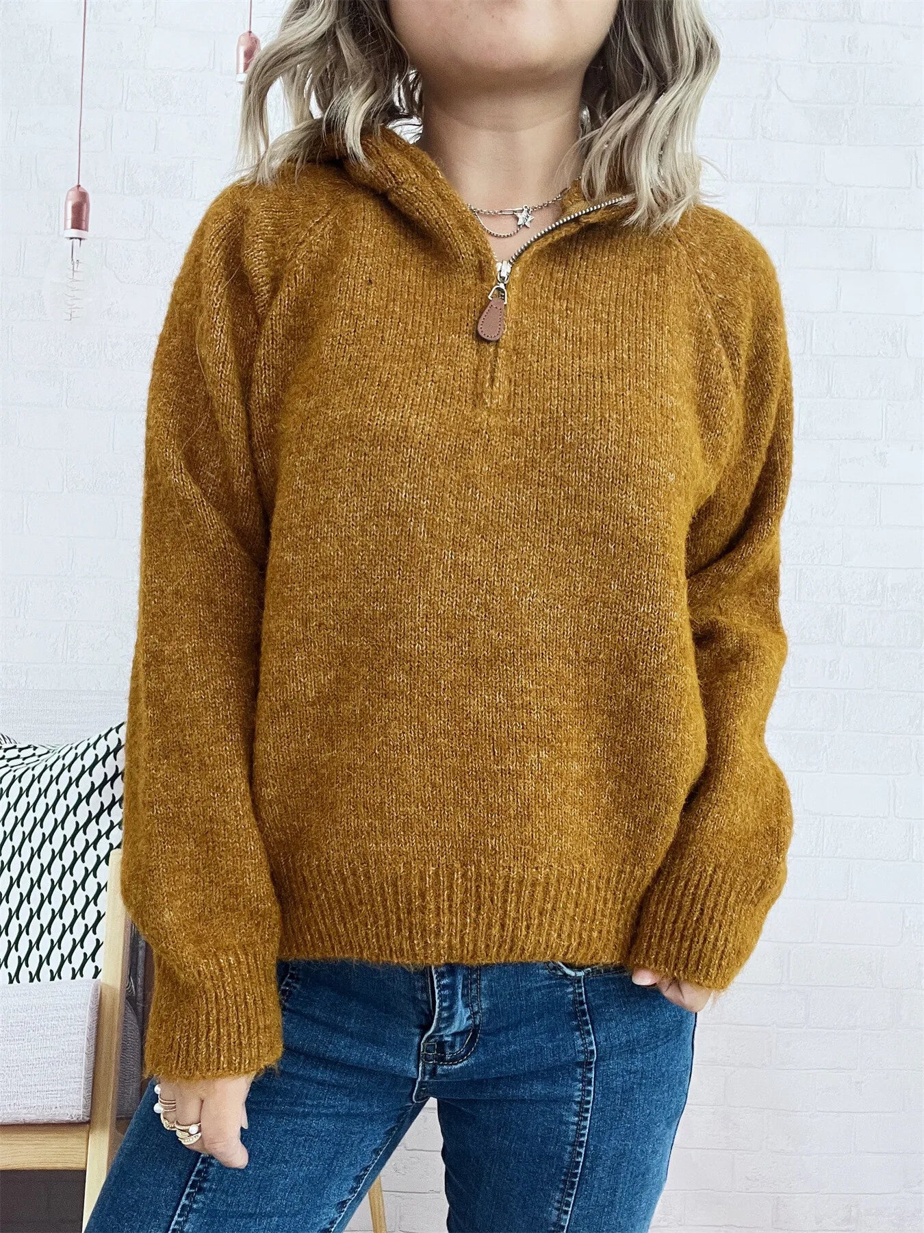 Brown quarter-zip ribbed hem sweater with long sleeves and textured knit