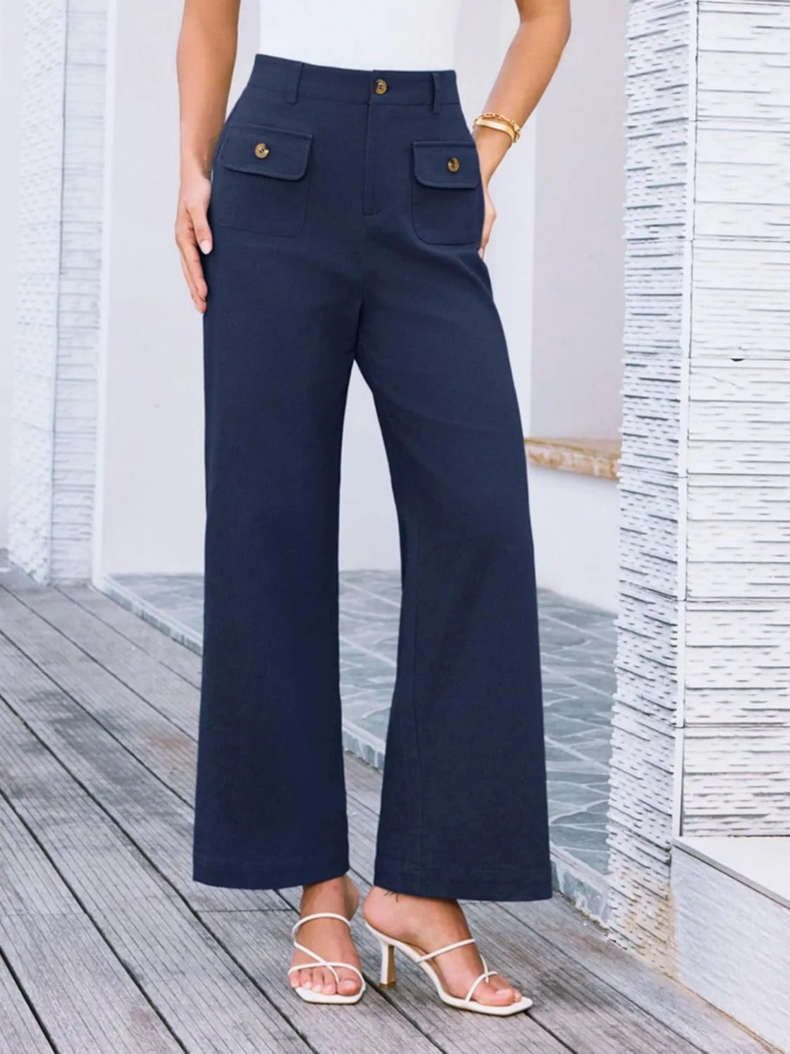 High waist wide leg pants in dark blue with front button and two flap pockets