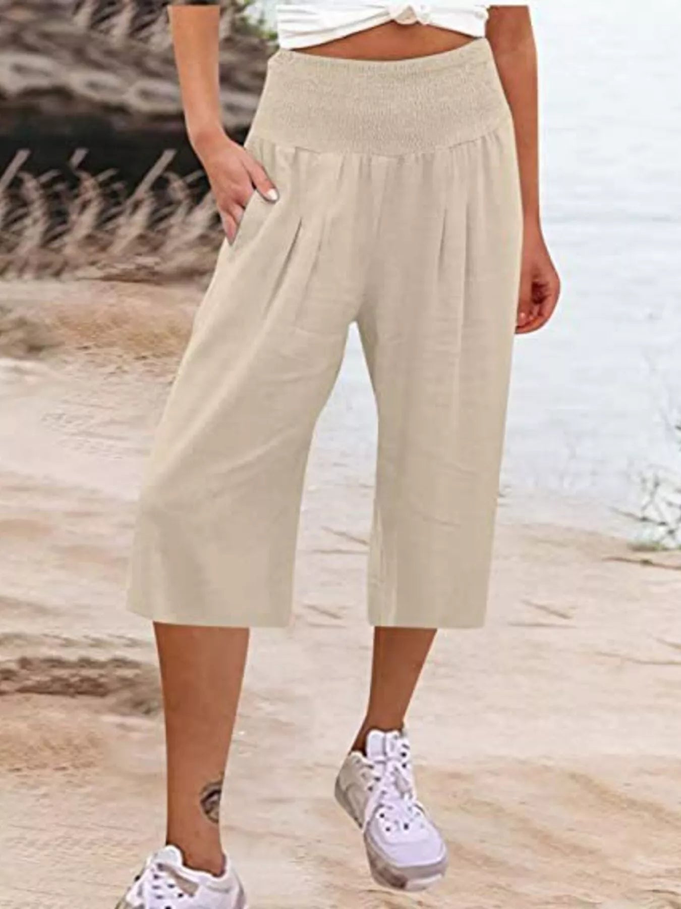 Smocked wide-leg capri pants in cream, gathered elastic waist and wide cropped legs