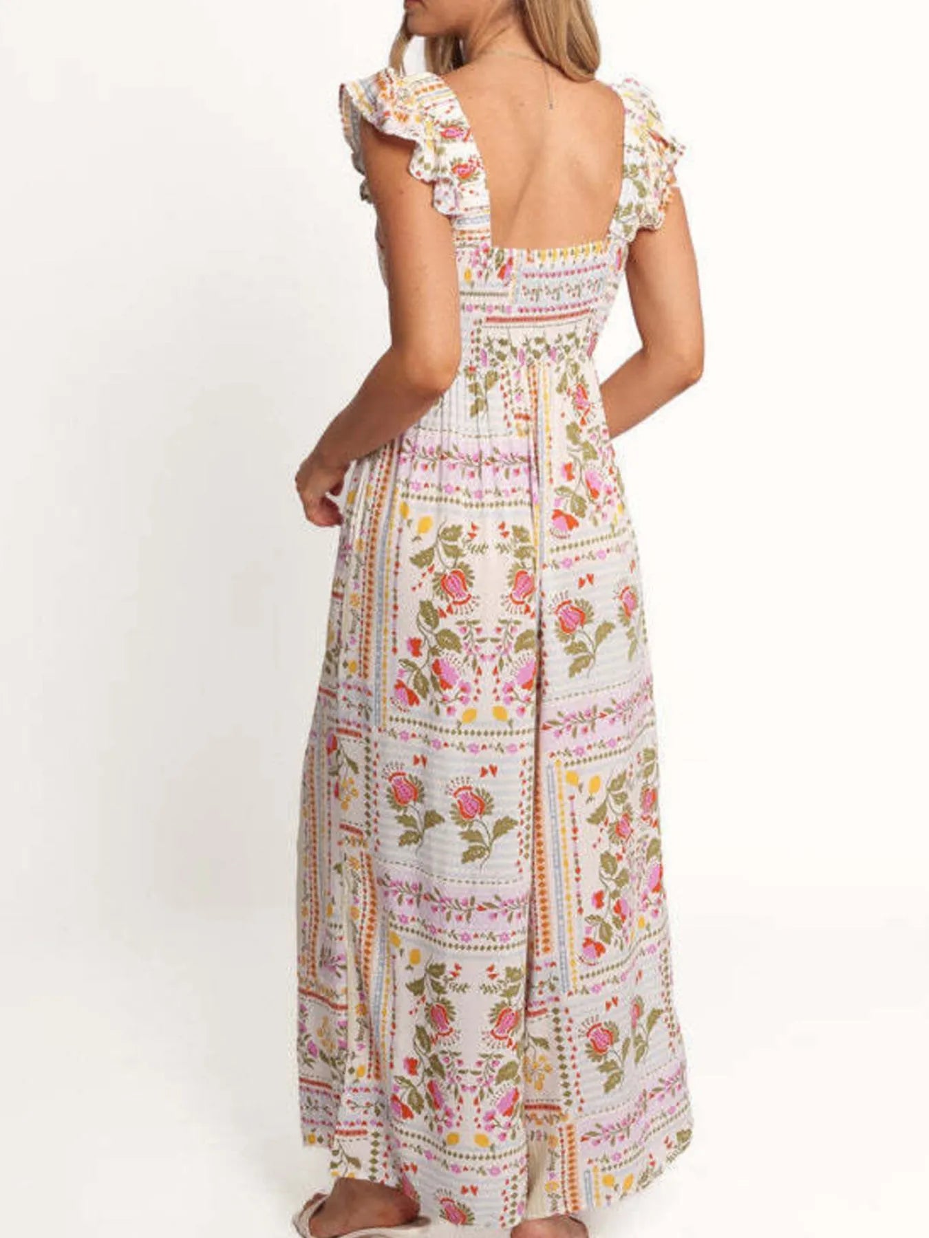 Floral print jumpsuit with ruffle shoulder straps and open back detail