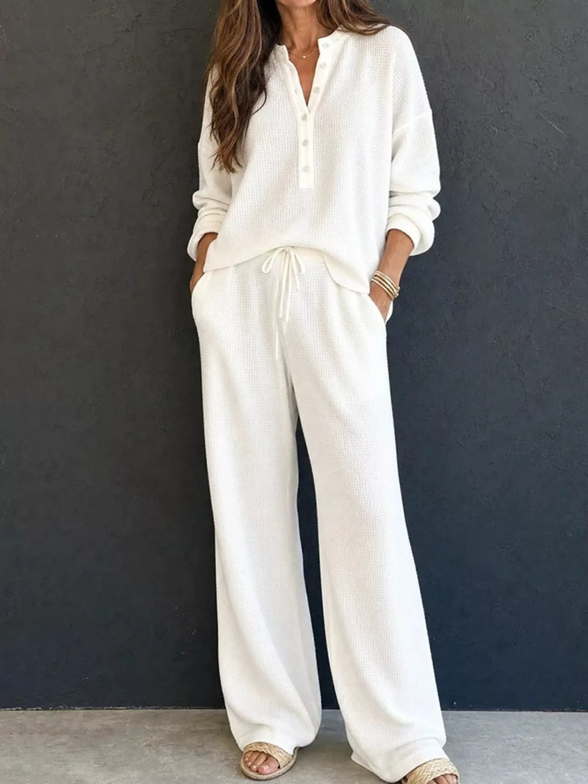 White waffle-knit lounge set: button henley pullover and drawstring wide-leg pants.