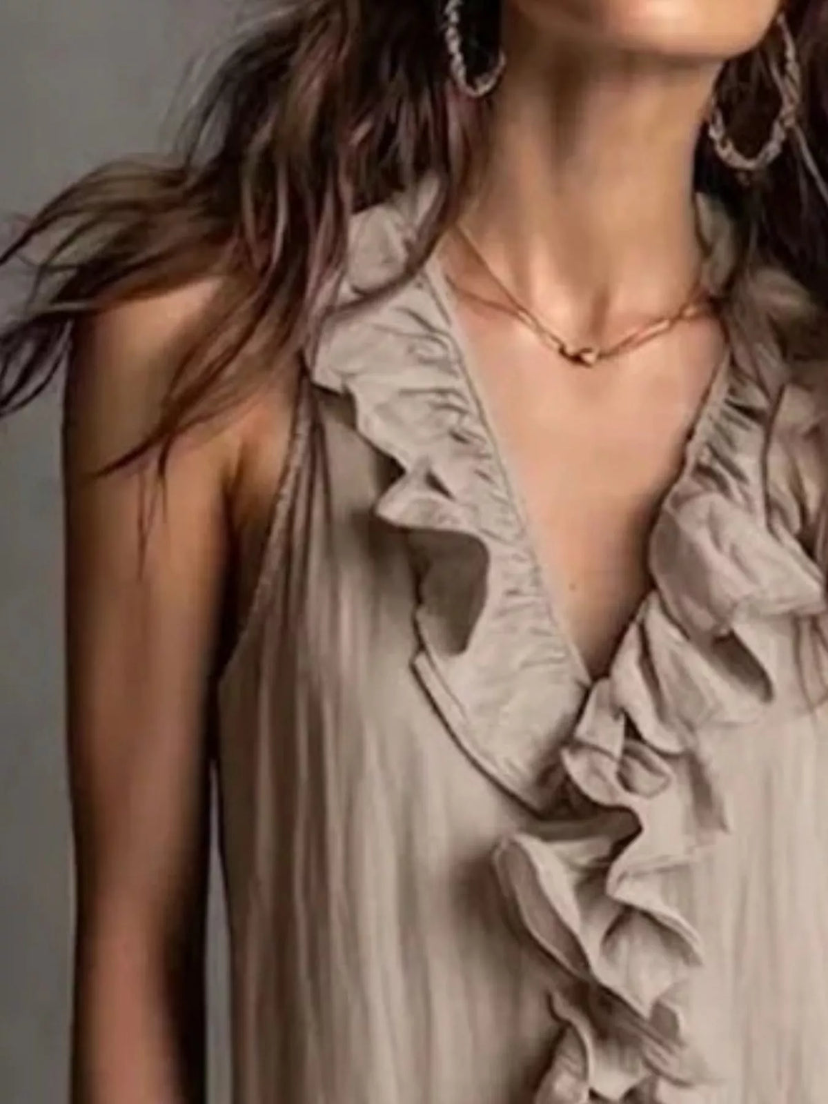 Khaki sleeveless V-neck ruffle midi dress close-up of ruffled neckline