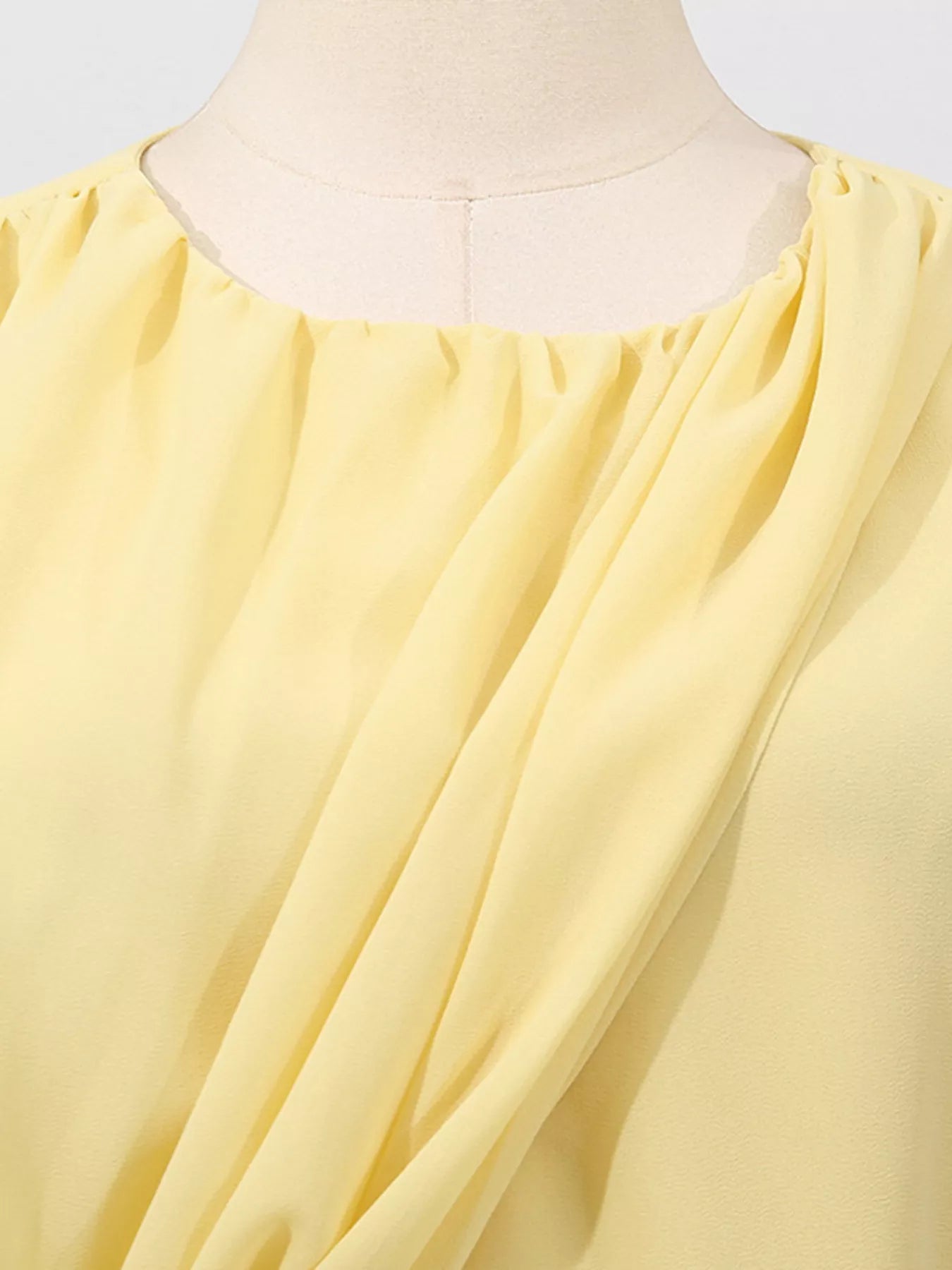 Cedar & Moore Sleeveless Ruched High-Slit Maxi Dress in pale yellow with gathered neckline on mannequin