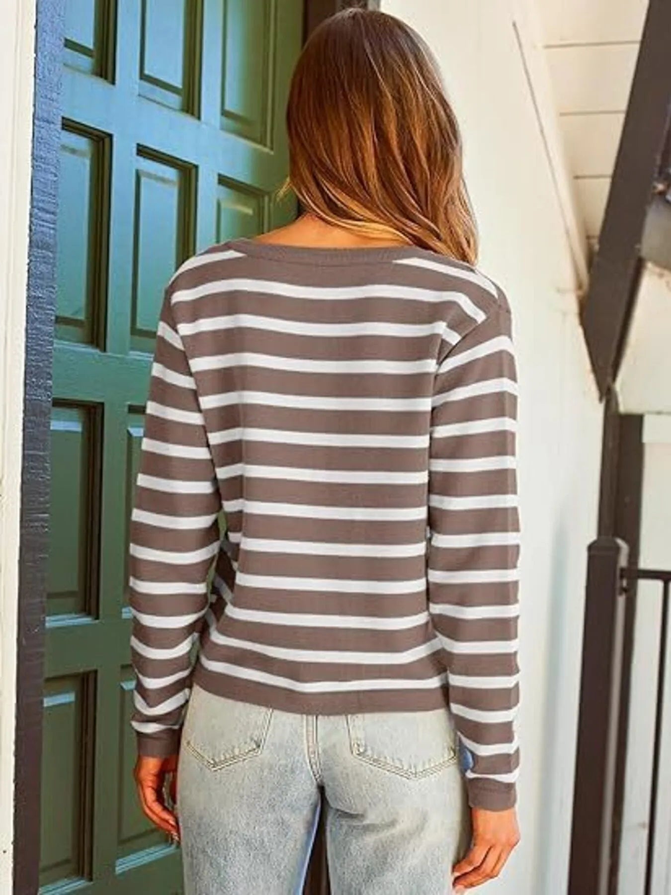 Mocha and white striped cardigan from the back with long sleeves