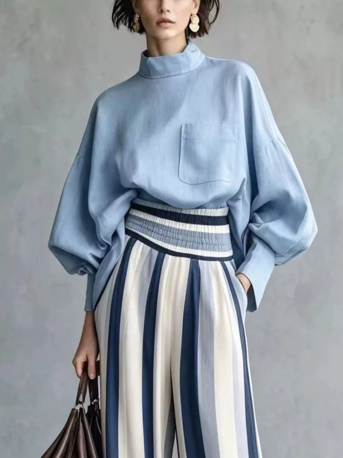 Light blue mock-neck top with chest pocket and striped wide-leg pants two-piece set