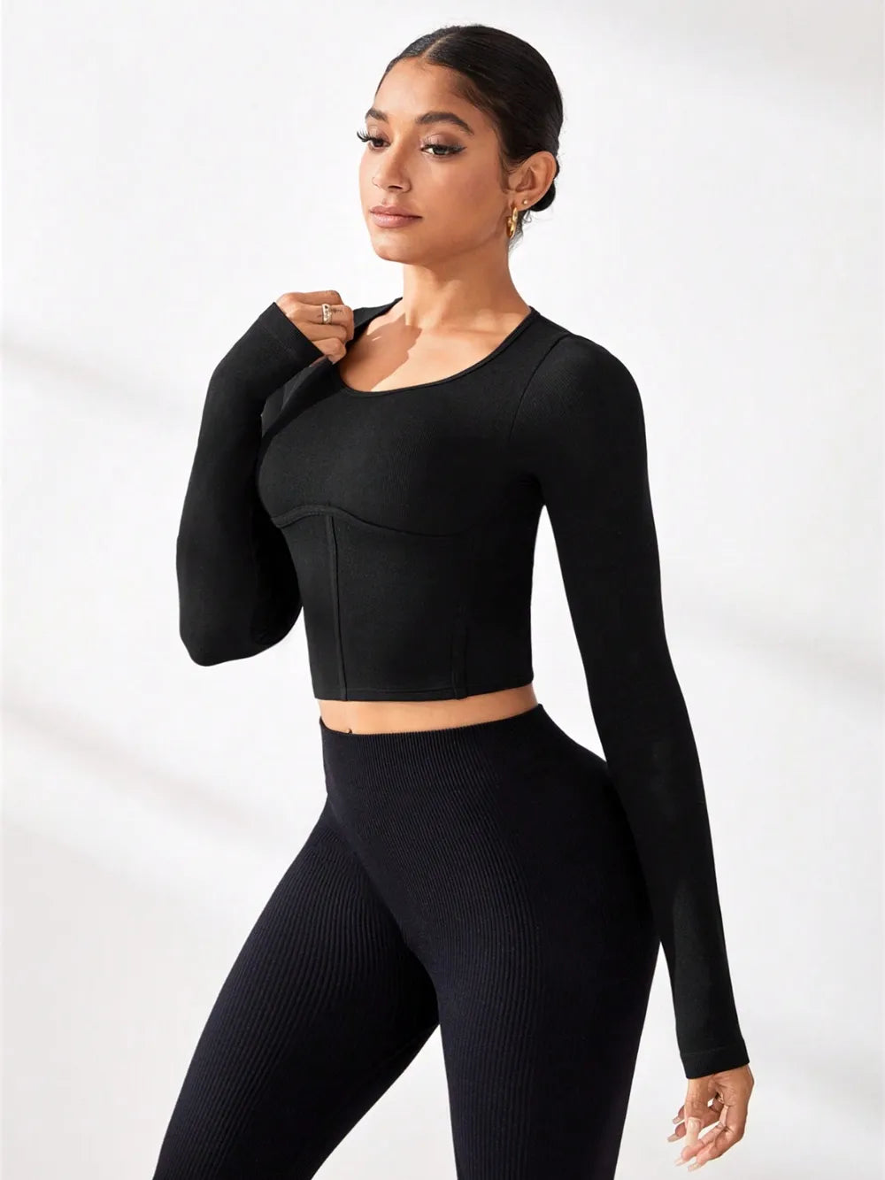 Black round-neck long-sleeve active t-shirt, front view, cropped