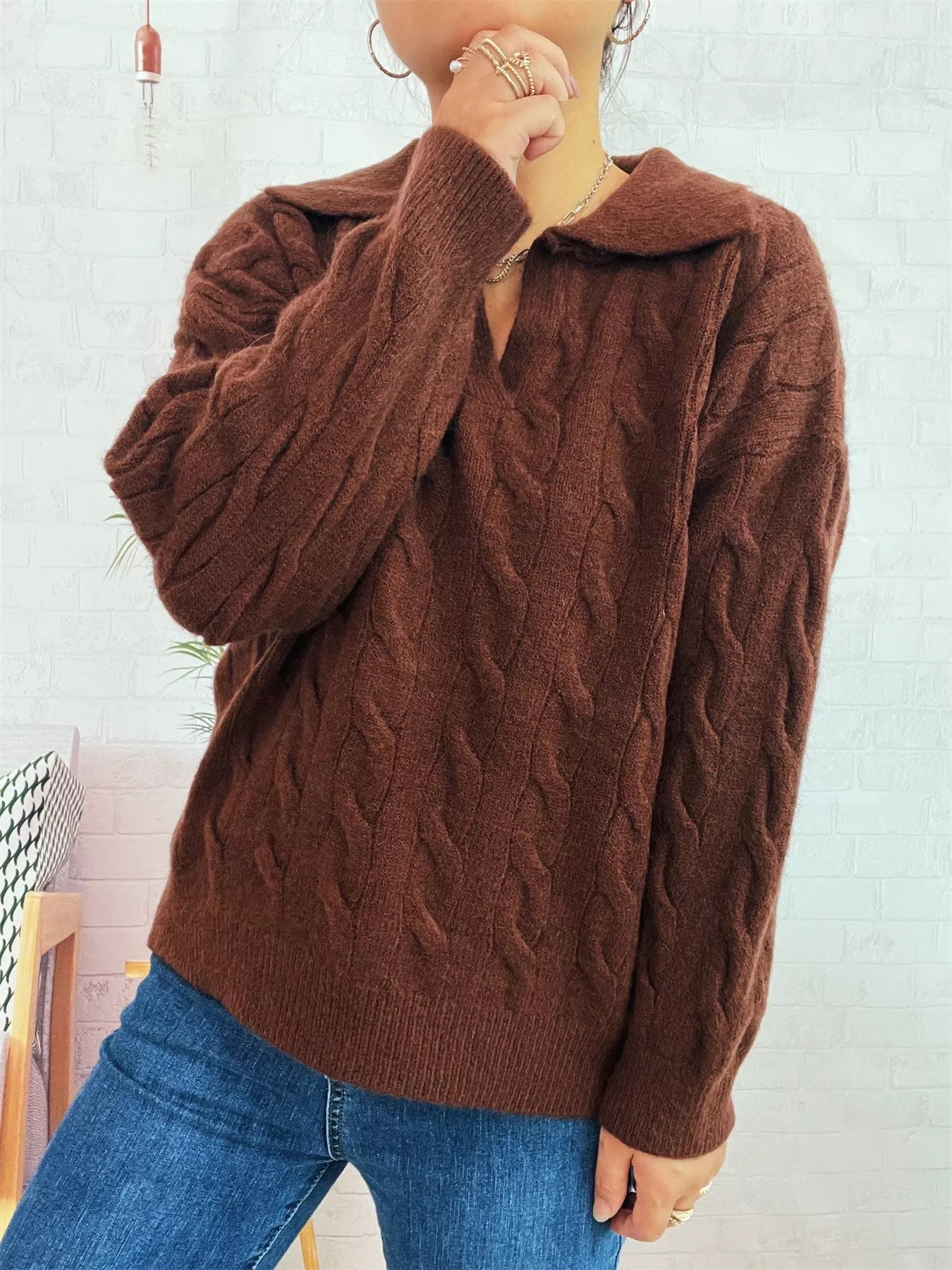 Brown cable knit Johnny-collar sweater with ribbed collar and raised cable pattern