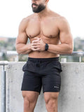Men's plus-size quick-dry shorts with pockets, black, elastic waistband, side logo