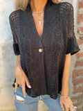 Openwork V-neck one-button cardigan with short sleeves and relaxed fit in black.