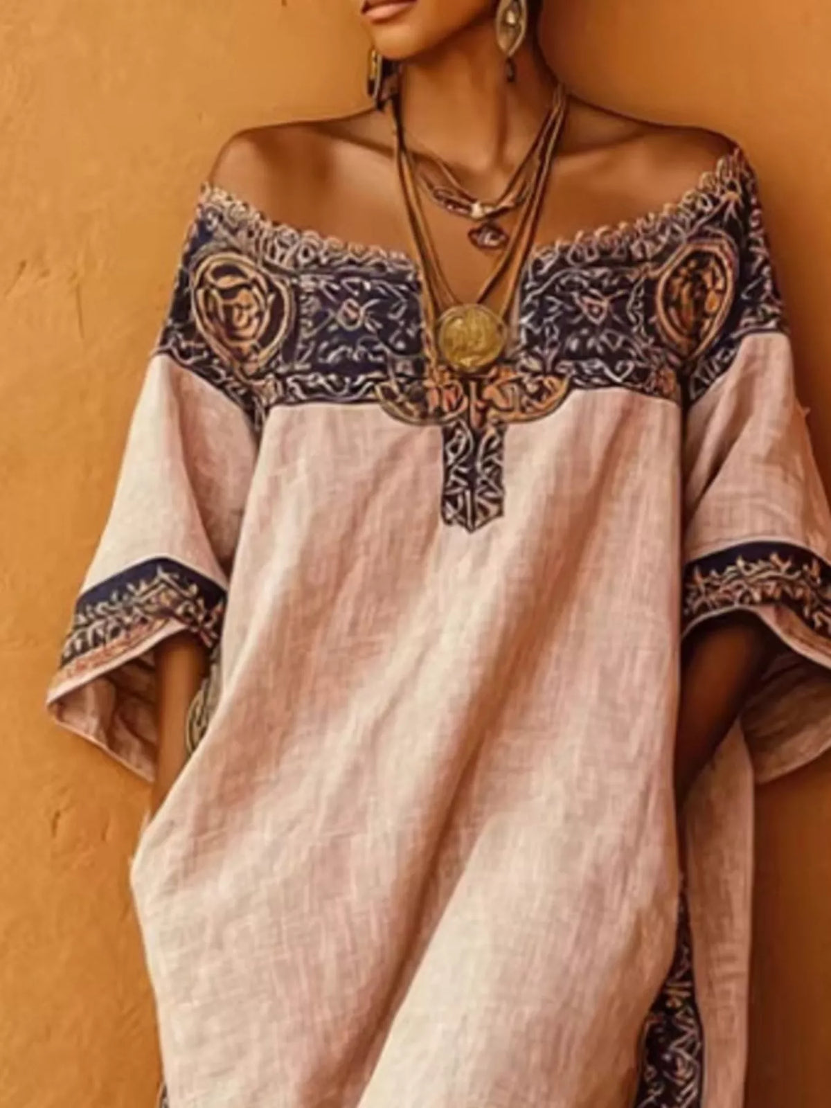 Dusty pink off-shoulder printed midi dress with ornate navy neckline and mandala motifs