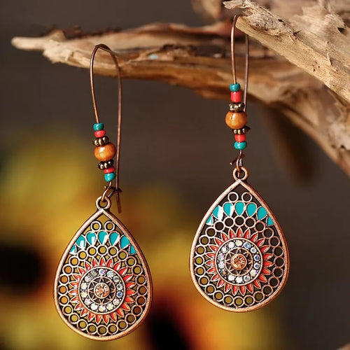 Copper teardrop beaded earrings with multicolor beads and turquoise center rosette