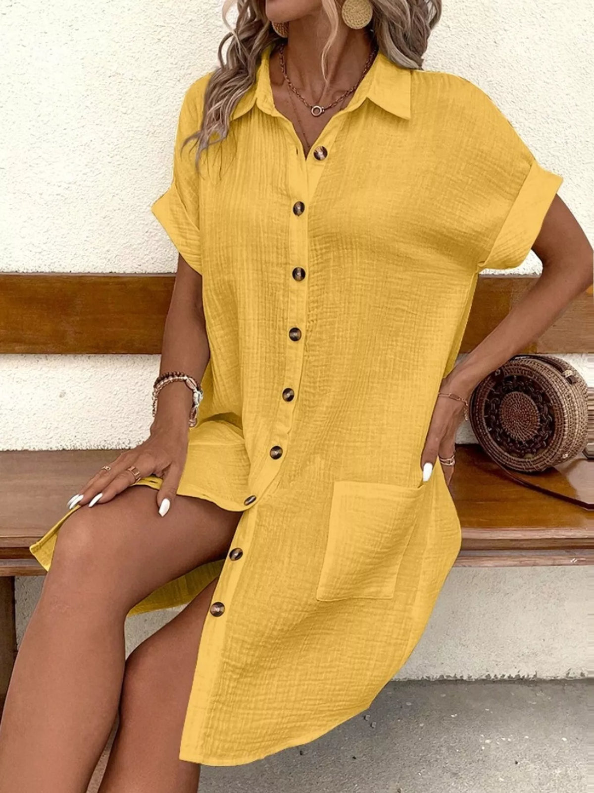 Yellow textured button-front shirt dress with collar and side pockets, short sleeves