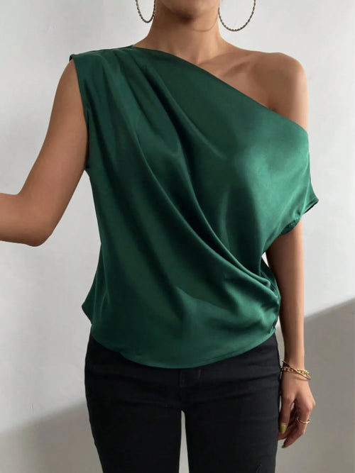 One-shoulder draped blouse in dark green, asymmetric neckline and layered wrap drape