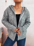 Gray cable knit hooded zip-up cardigan with long sleeves and ribbed hem and cuffs.
