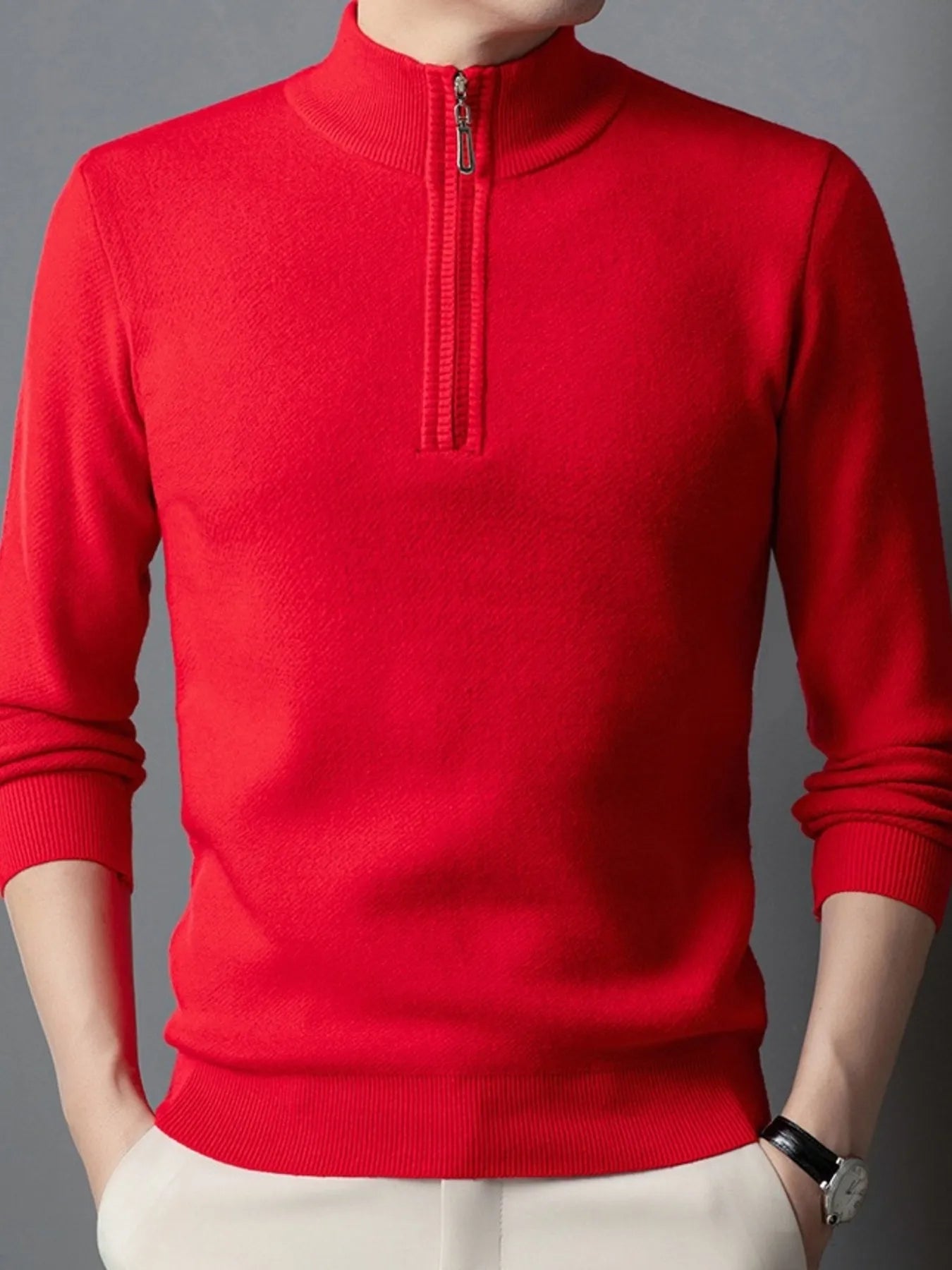 Red quarter-zip long-sleeve sweater with ribbed cuffs and front zipper placket