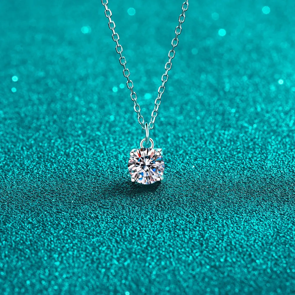 Sterling silver necklace with round moissanite pendant and link chain