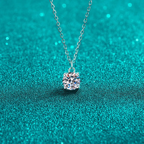 Sterling silver necklace with round moissanite pendant and link chain