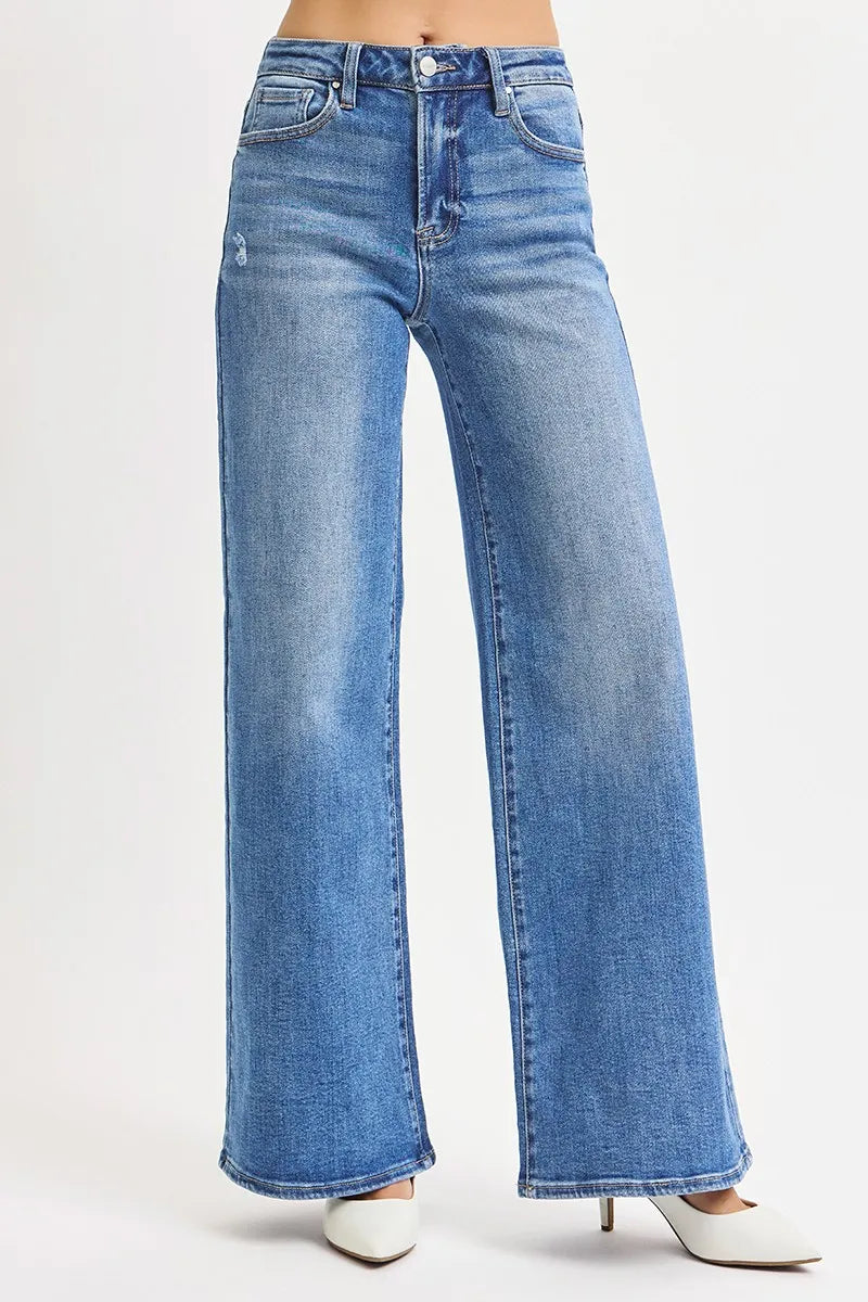 Medium wash high-rise wide-leg jeans with button-front and stitched seams
