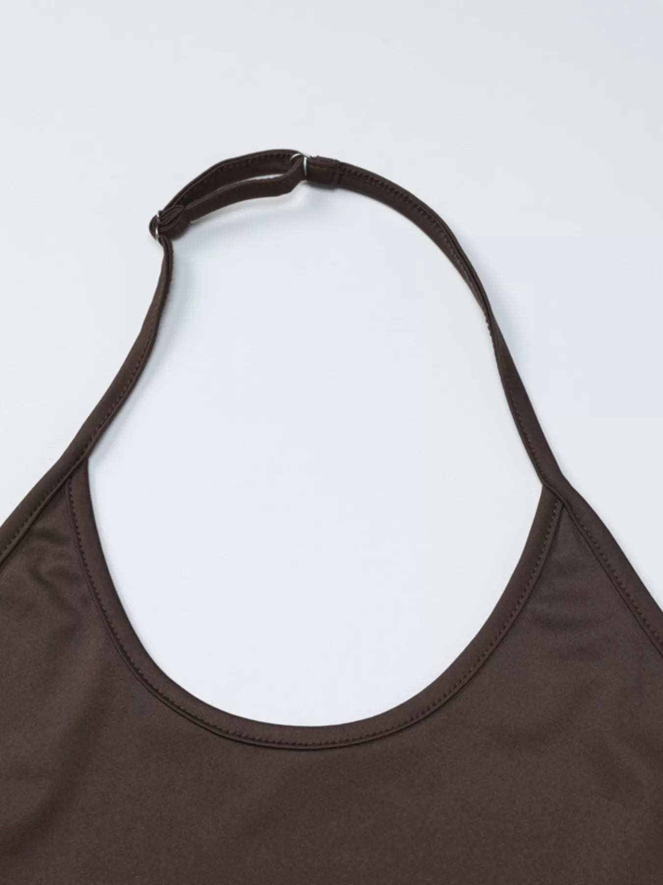 Dark brown halter neck crop top neckline