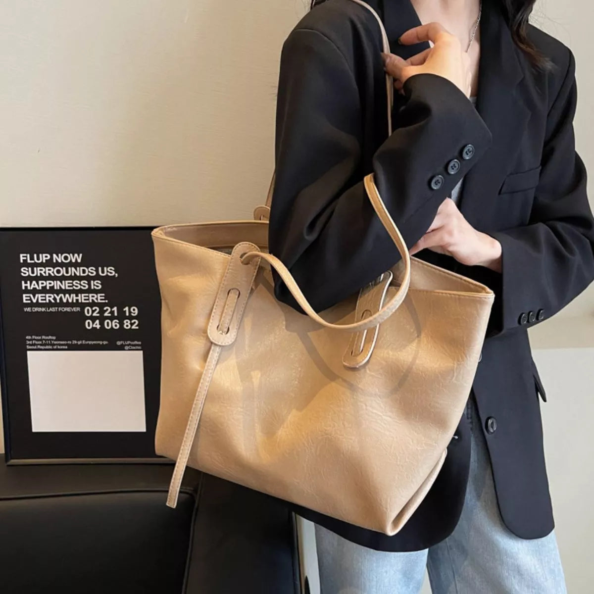 Khaki vegan leather shoulder bag tote with adjustable straps and top carry handles