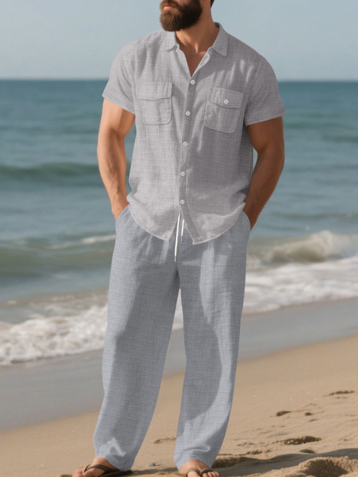 Light gray men’s short-sleeve button-up shirt and matching relaxed pants set