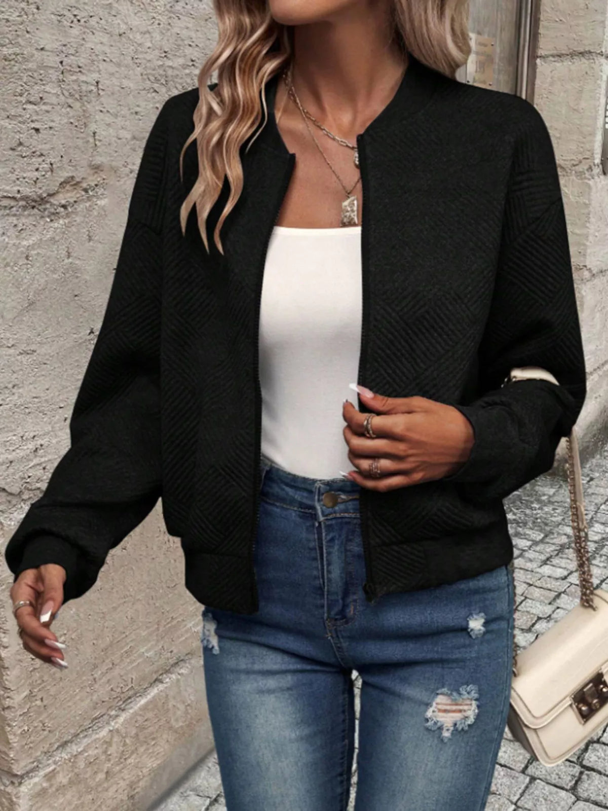 Black textured knit zip bomber jacket with front zipper and side pockets