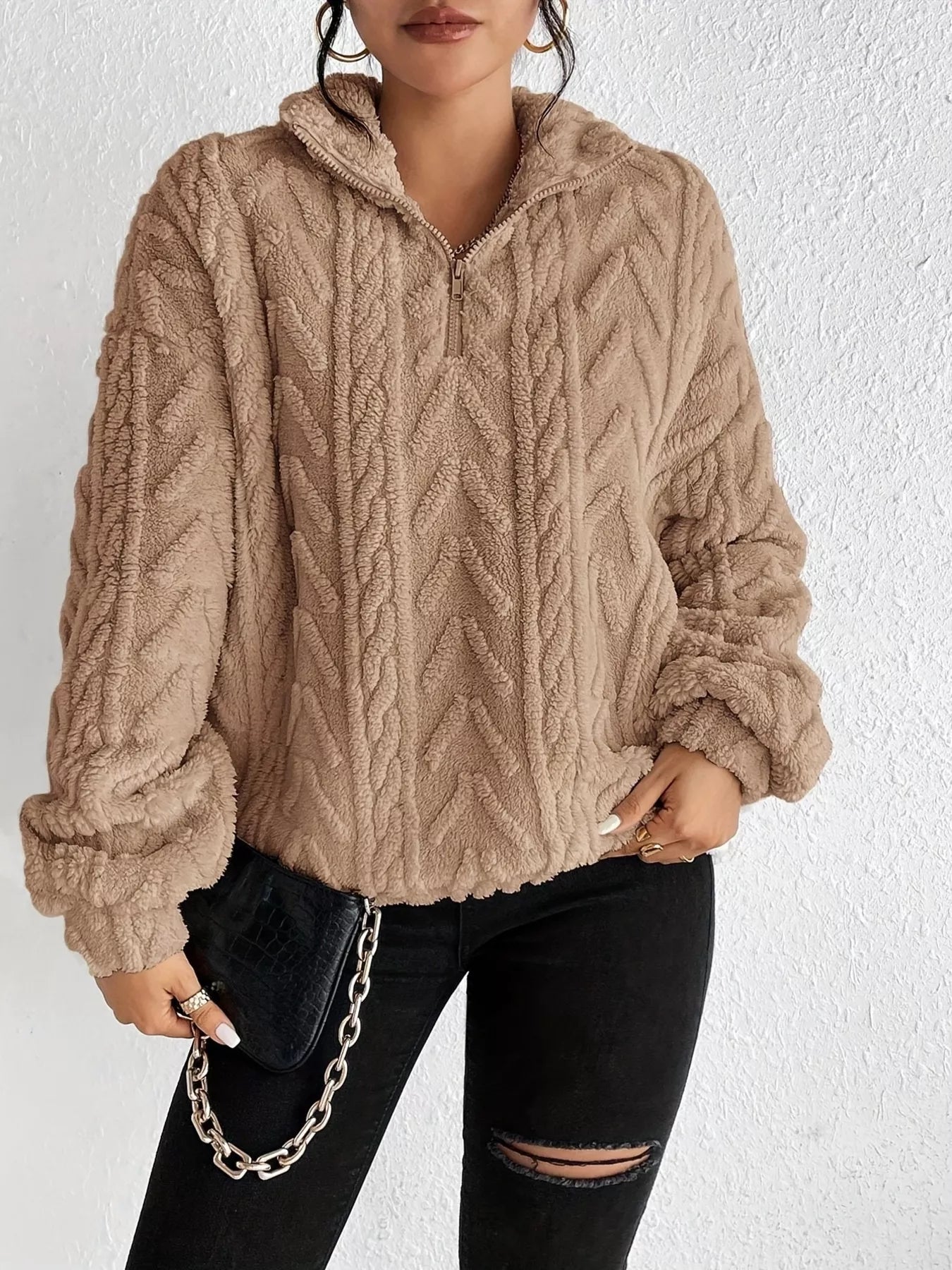 Apricot cable sherpa quarter-zip sweatshirt with dropped shoulders and ribbed cuffs