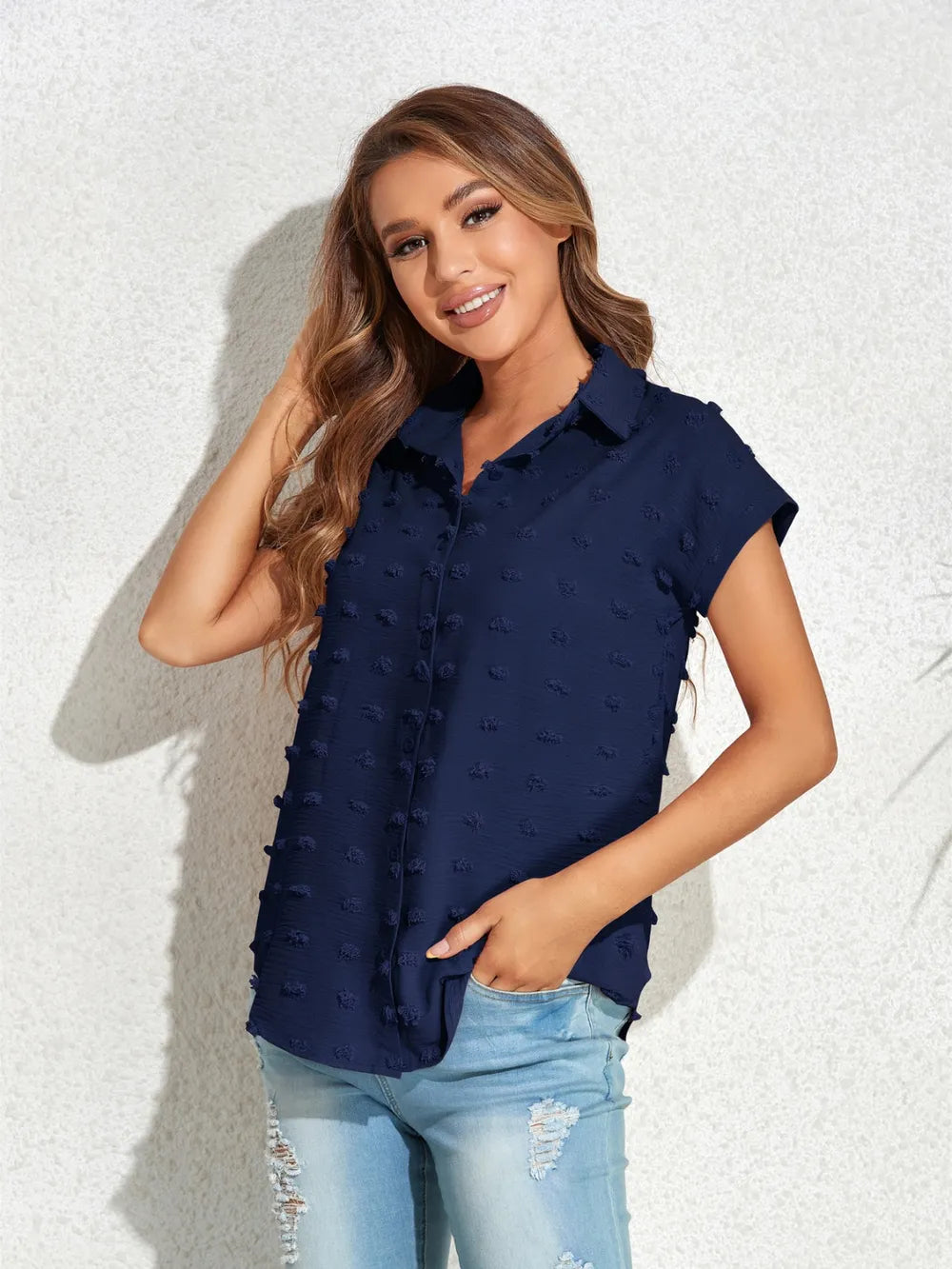 Navy Swiss-dot cap-sleeve button-up shirt with front buttons