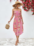 Hot pink strapless tie-belt dress with colorful geometric print, gathered waist, midi length