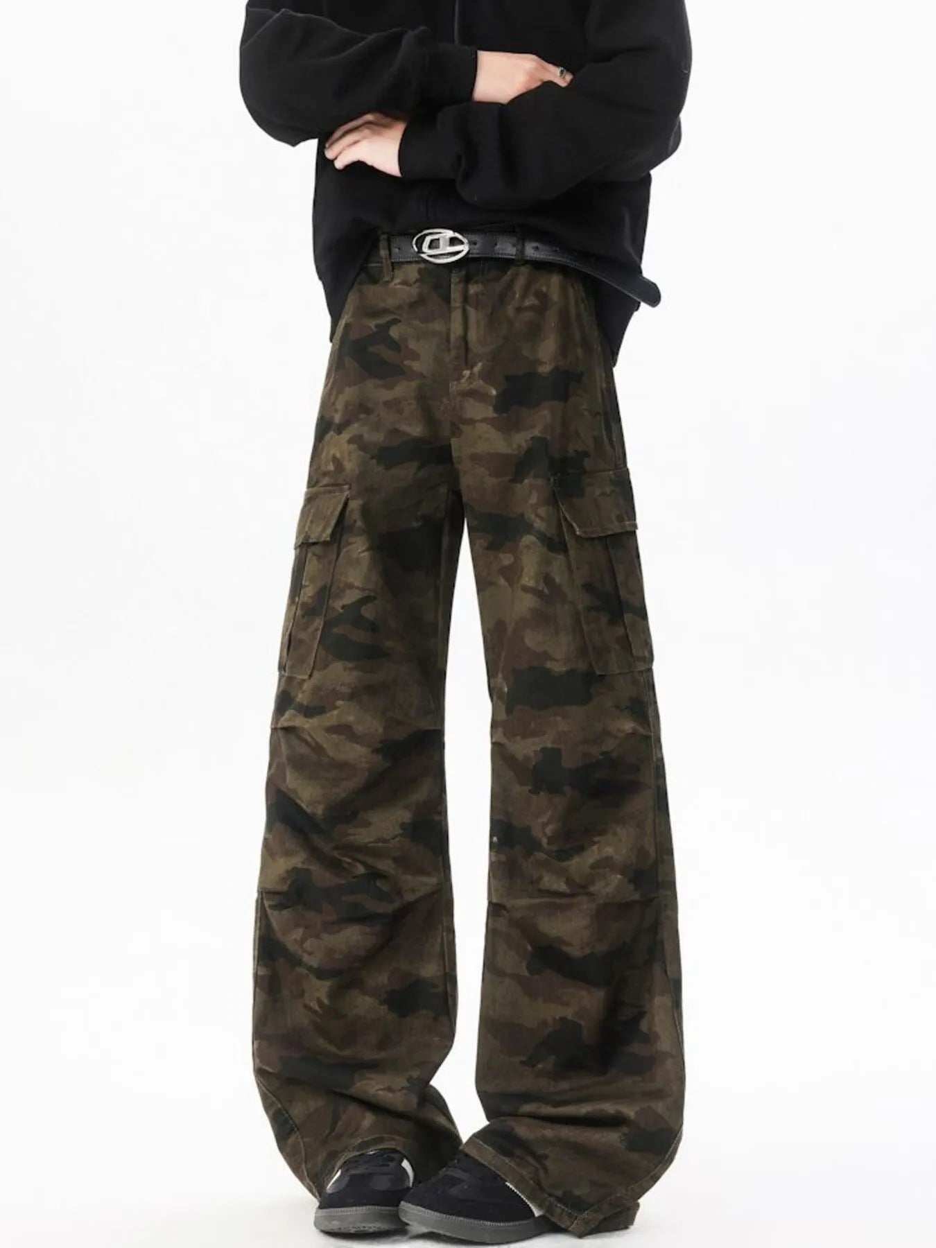 Camouflage wide-leg cargo pants with black belt, front pleats, and flap cargo pockets