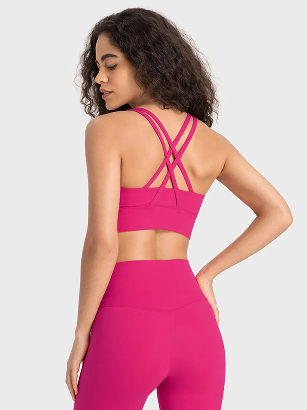 Hot pink active tank top with scoop front and crisscross open-back straps