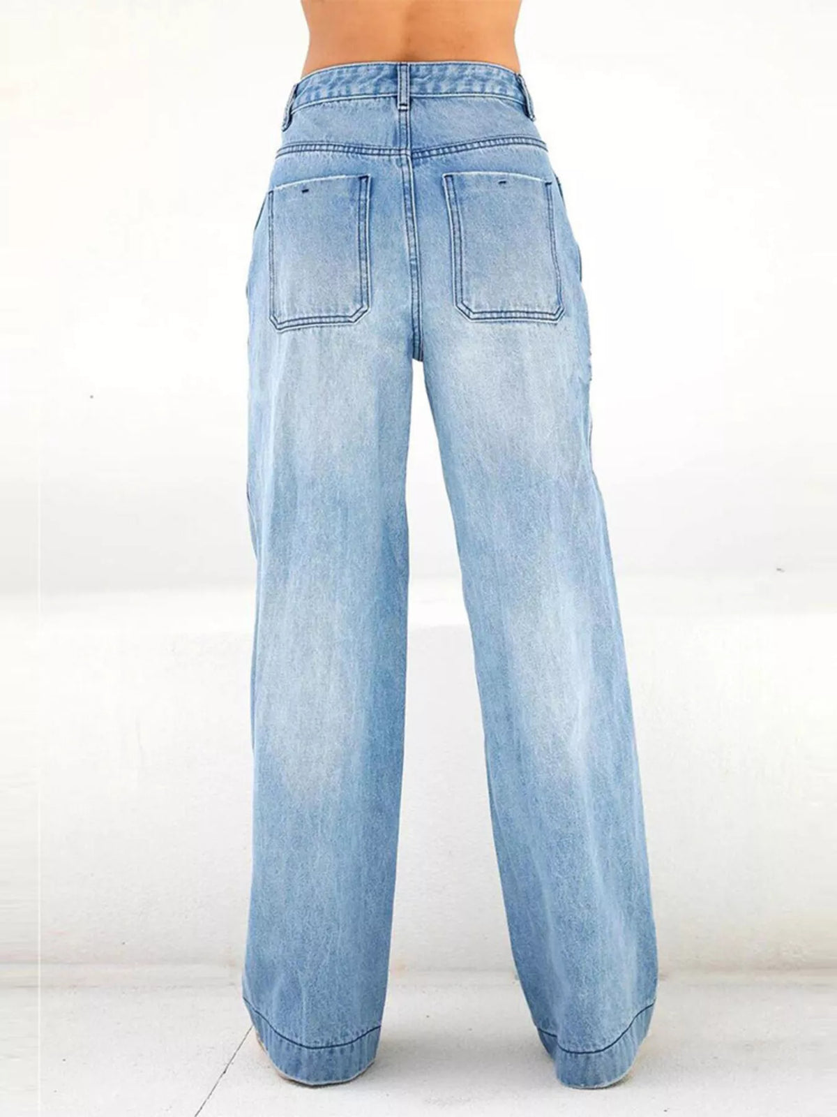 High-waisted wide-leg light blue jeans with two back pockets and belt loops