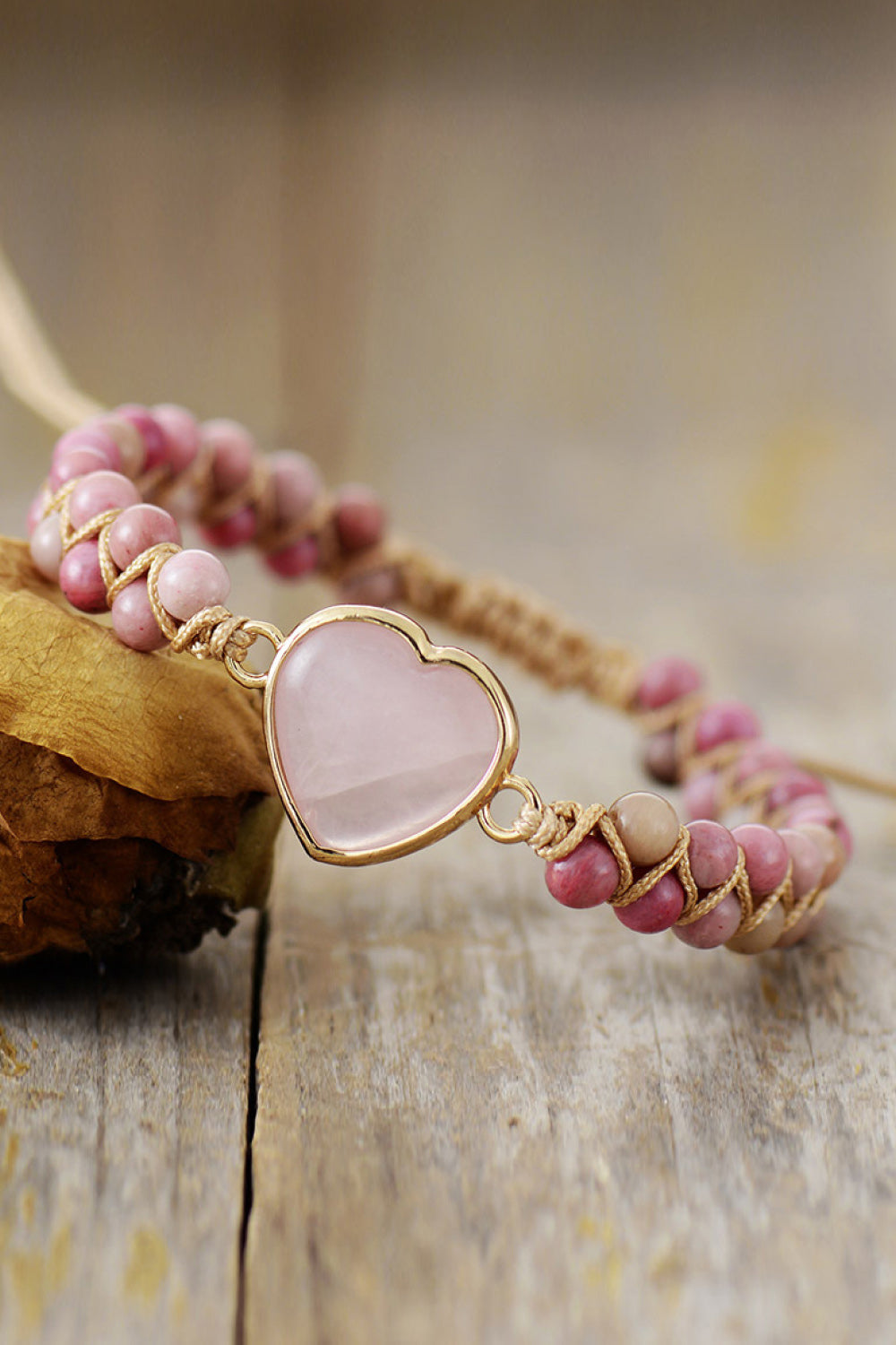 Dusty pink heart beaded bracelet with gold-tone rose quartz heart charm