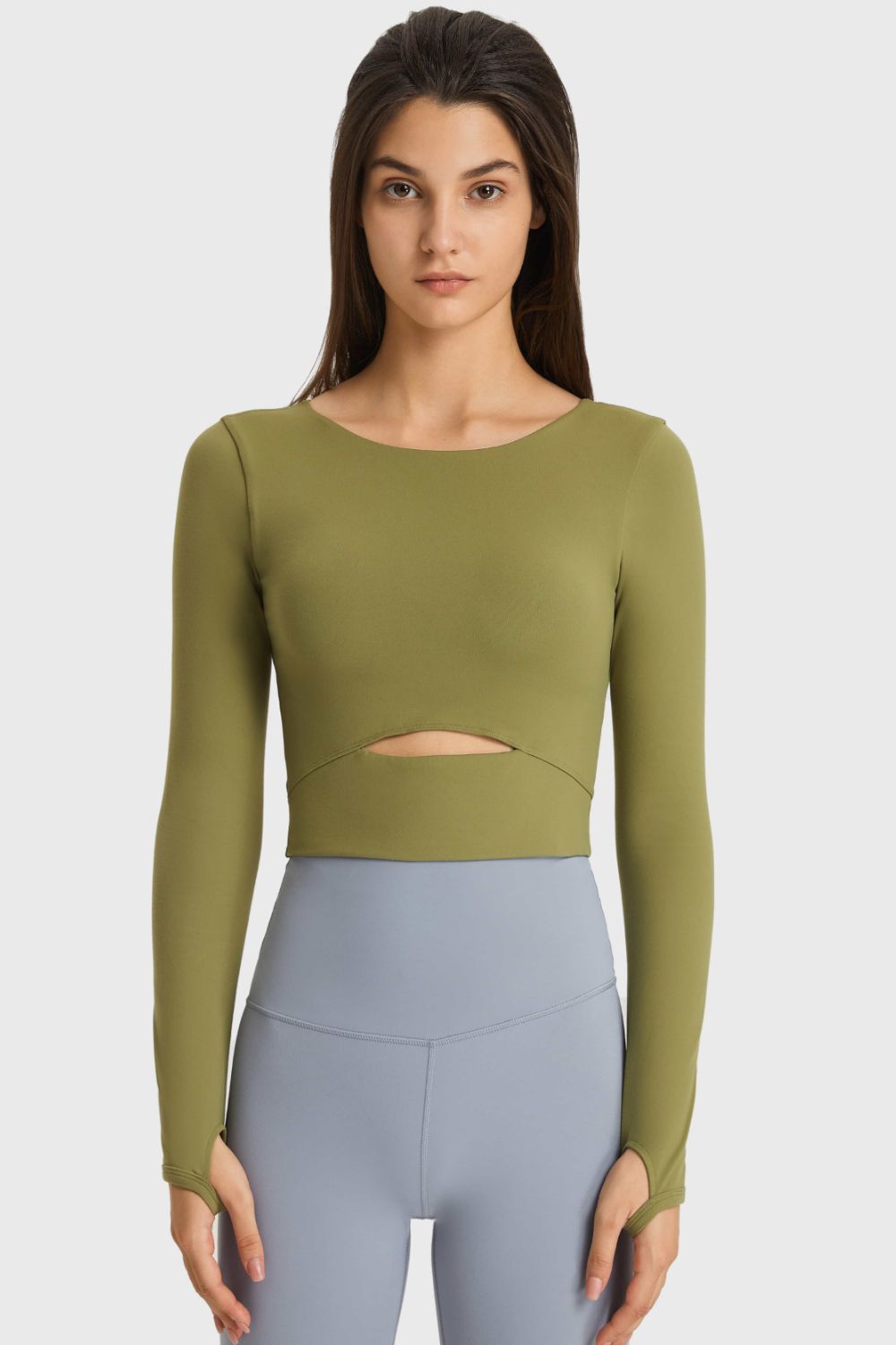 Olive green long-sleeve cropped sports top with waist cutout