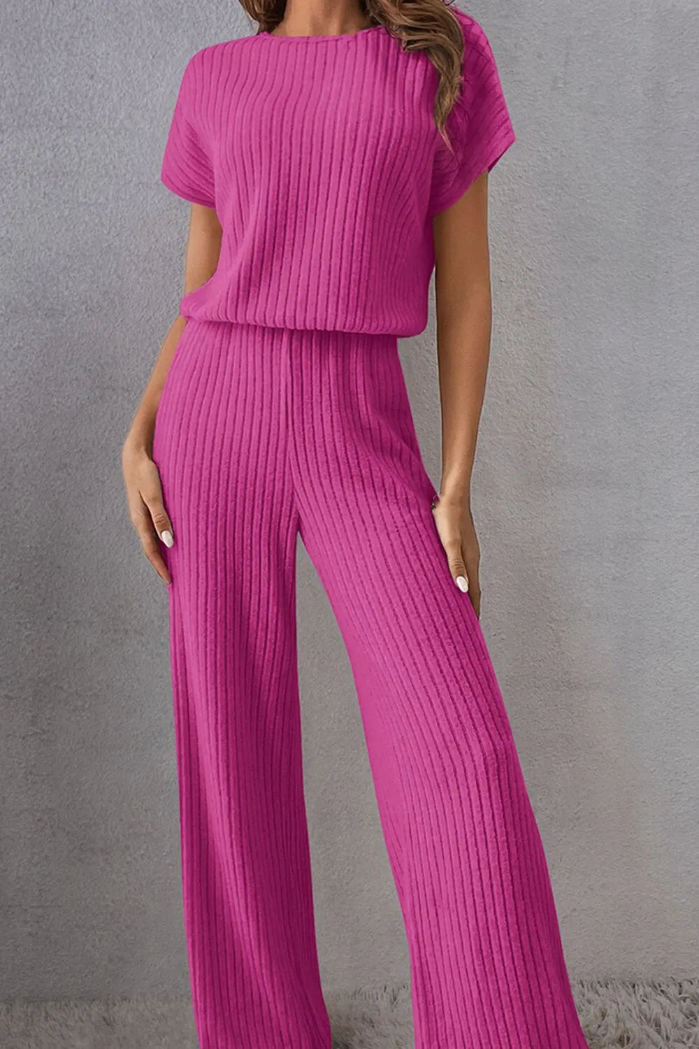 Hot pink ribbed knit round-neck short-sleeve jumpsuit with wide legs
