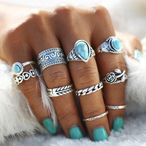 Silver-tone alloy ring set with turquoise-style stone bands and patterned accents